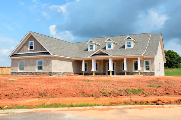 House with dirt yard
