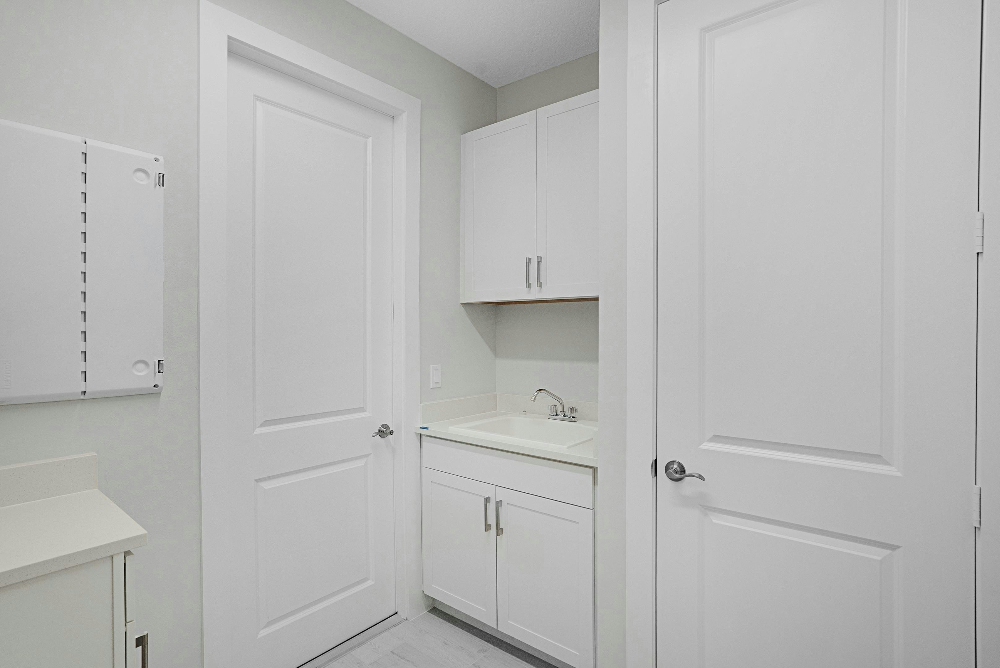 Laundry Room | 2148 Falls Manor