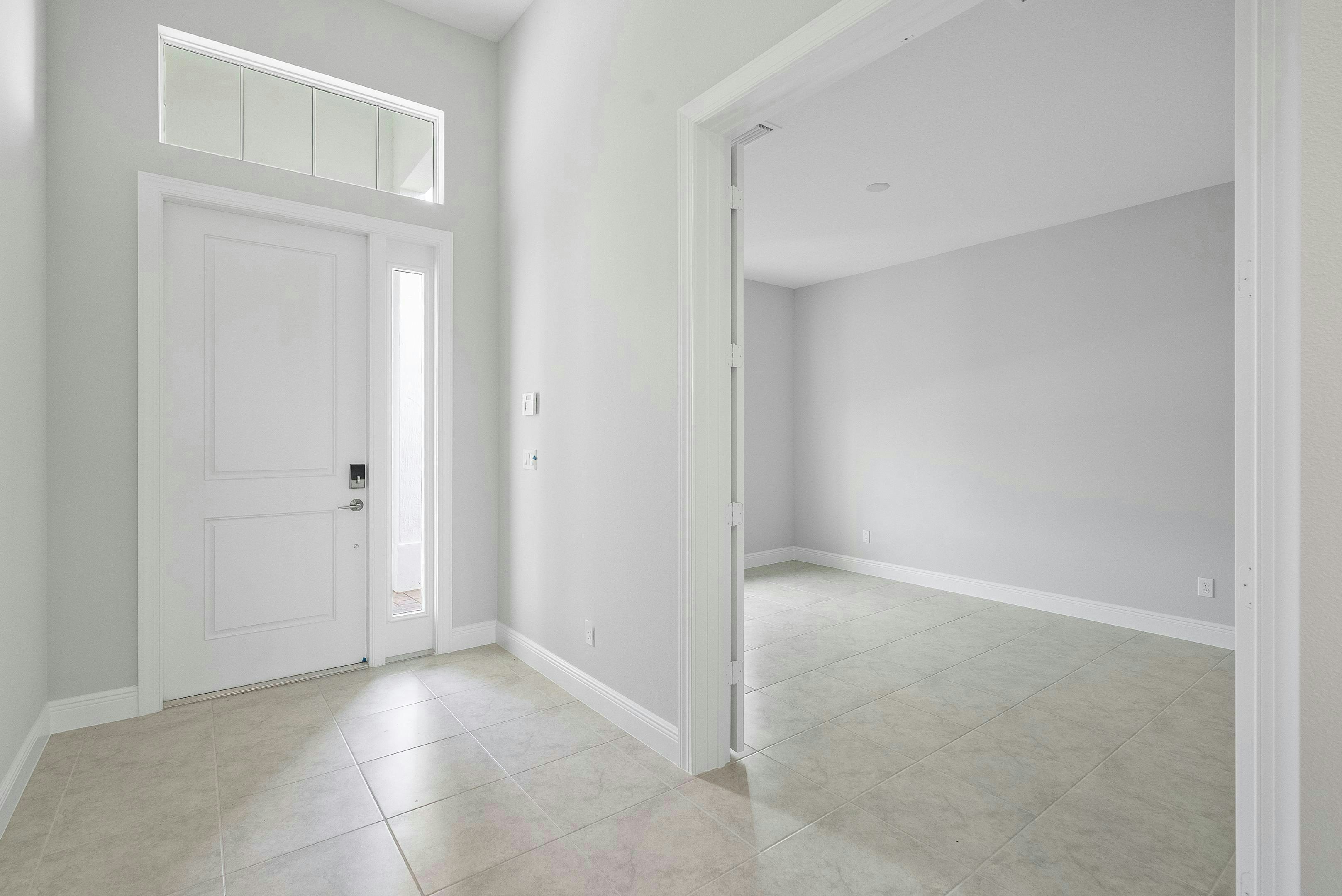 Foyer and Den | 12398 SW Sunrise Lake Terrace