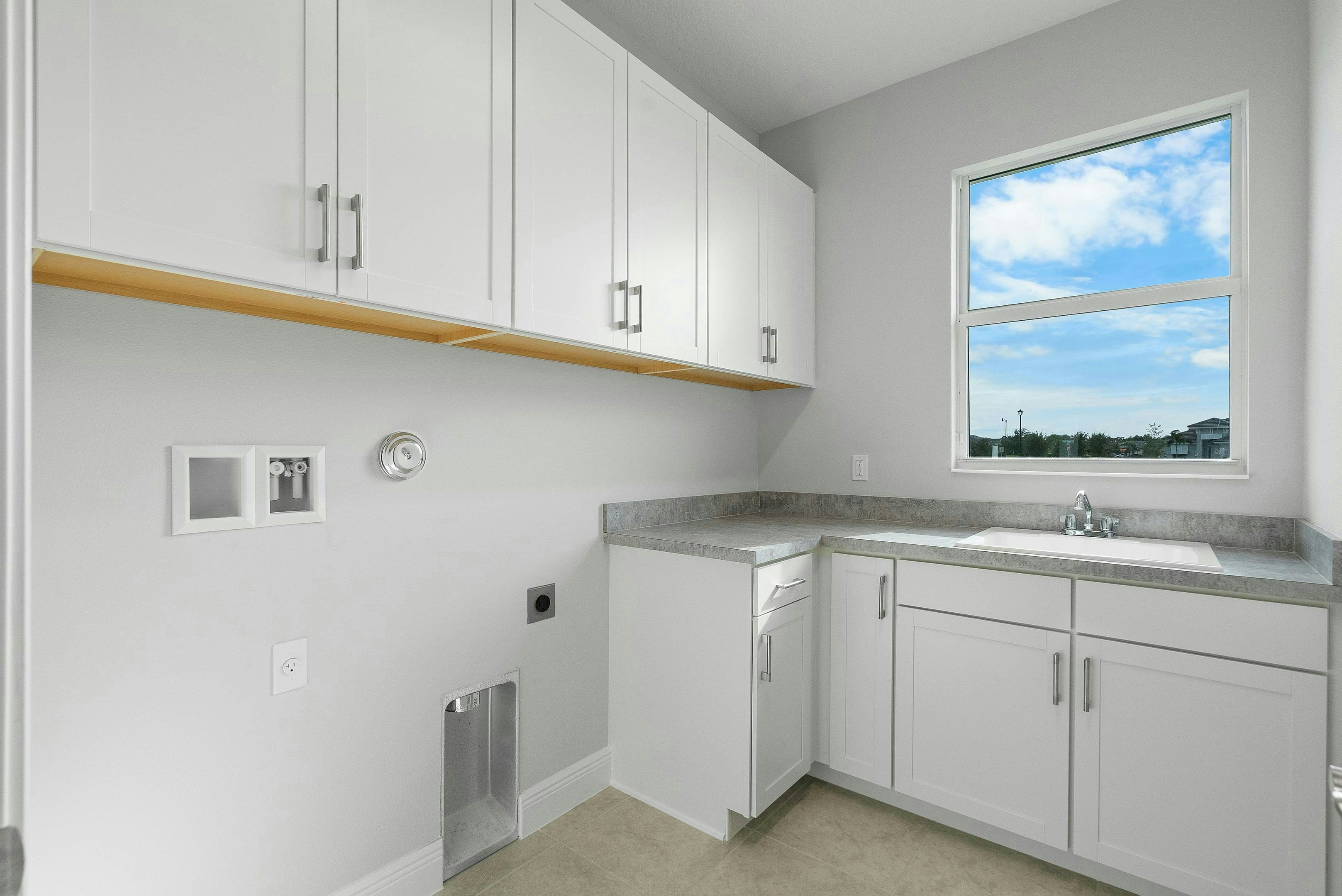 Laundry Room | 12398 SW Sunrise Lake Terrace