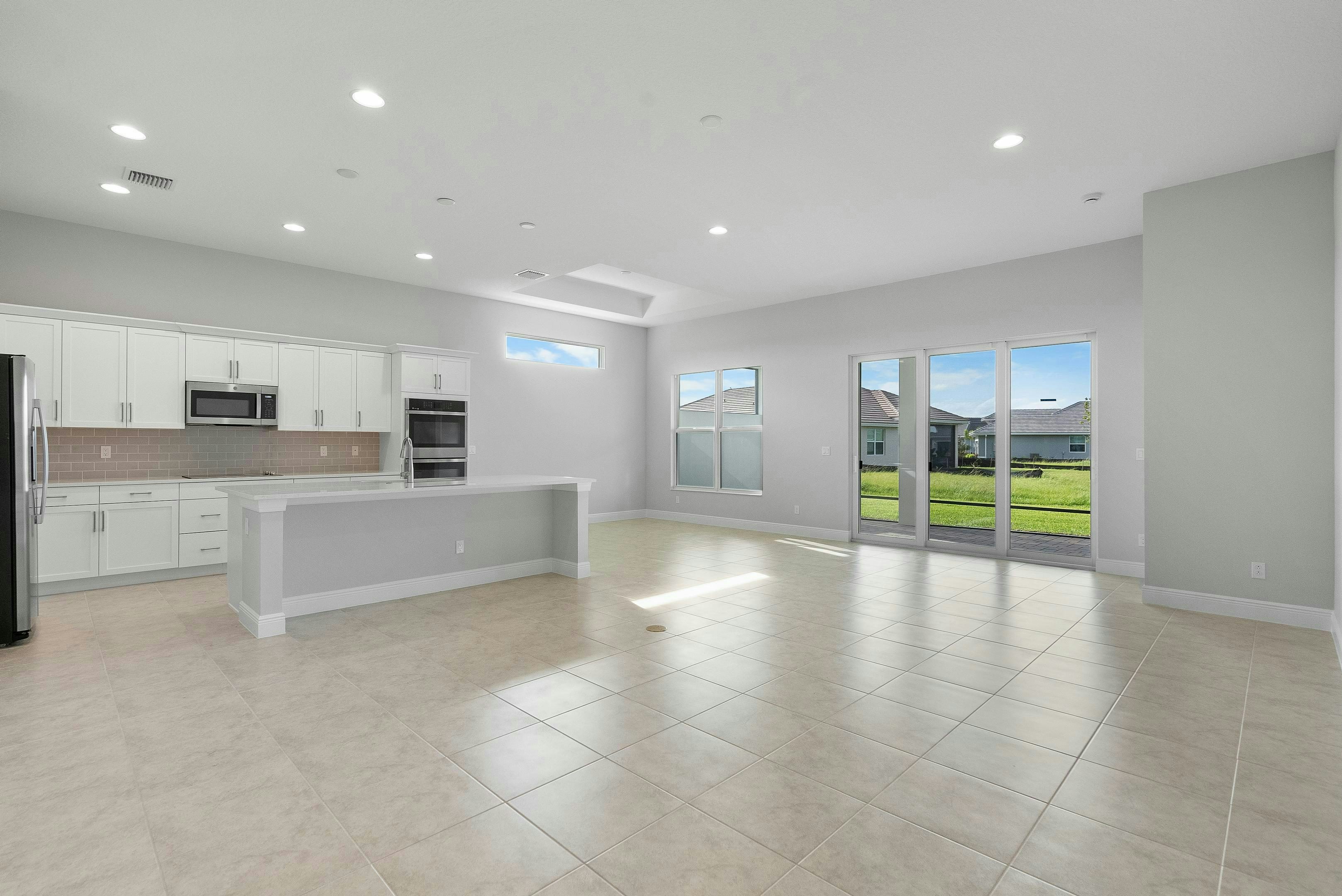 Great Room, Dining and Kitchen | 12398 SW Sunrise Lake Terrace