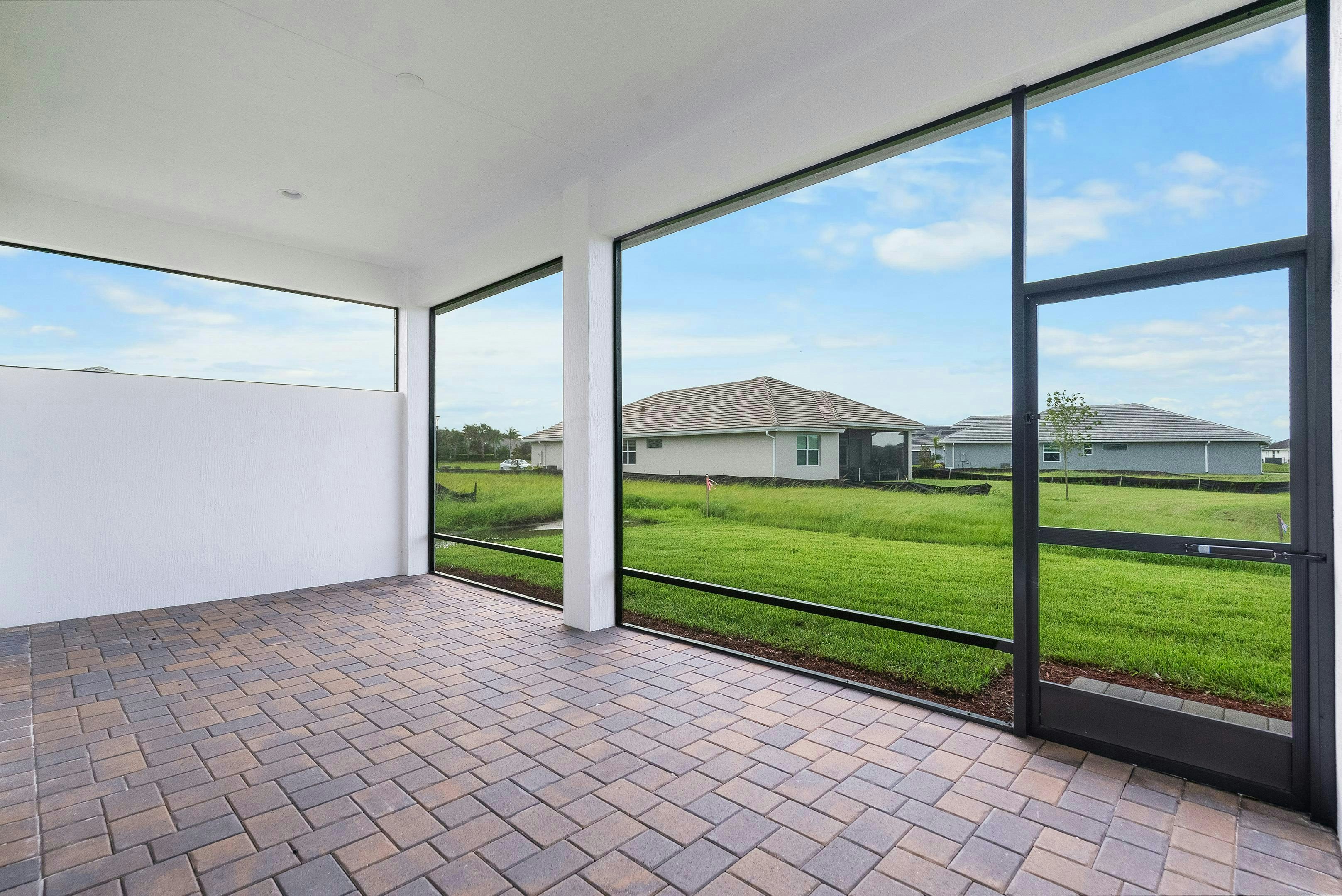 Lanai to yard | 12398 SW Sunrise Lake Terrace