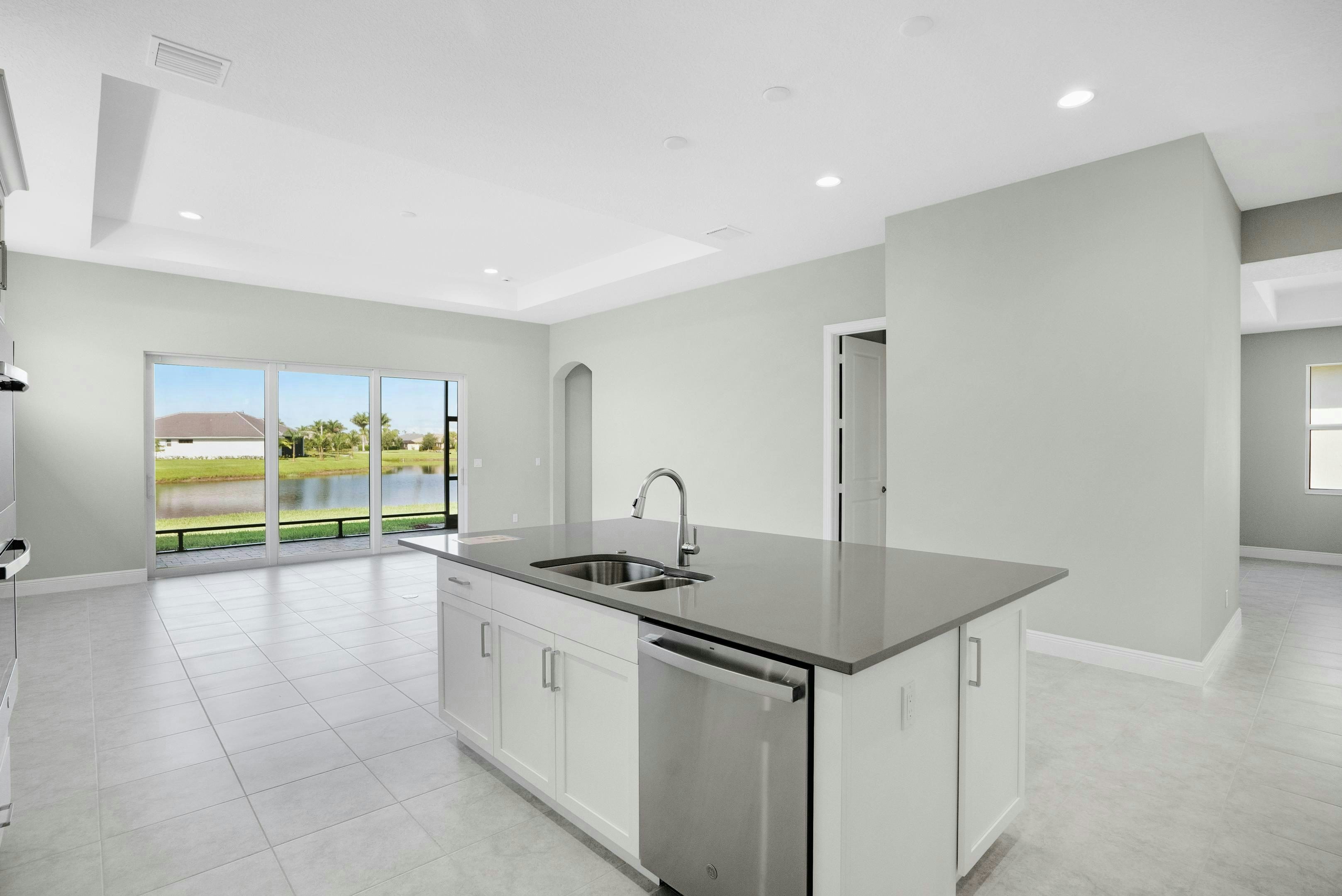 Kitchen to Great Room & Lanai | 12446 SW Sunrise Lake Terrace