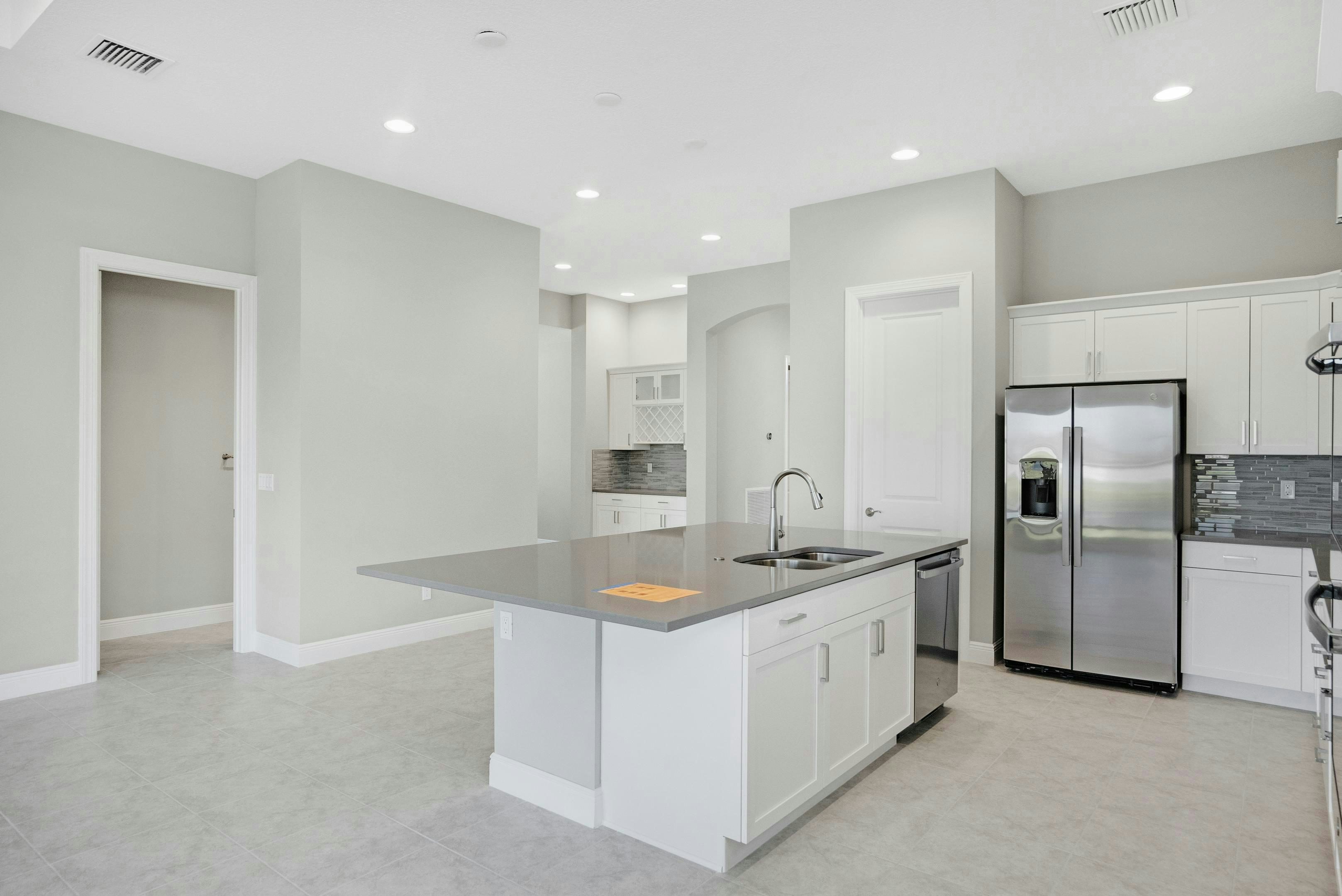 Kitchen to Dining | 12446 SW Sunrise Lake Terrace