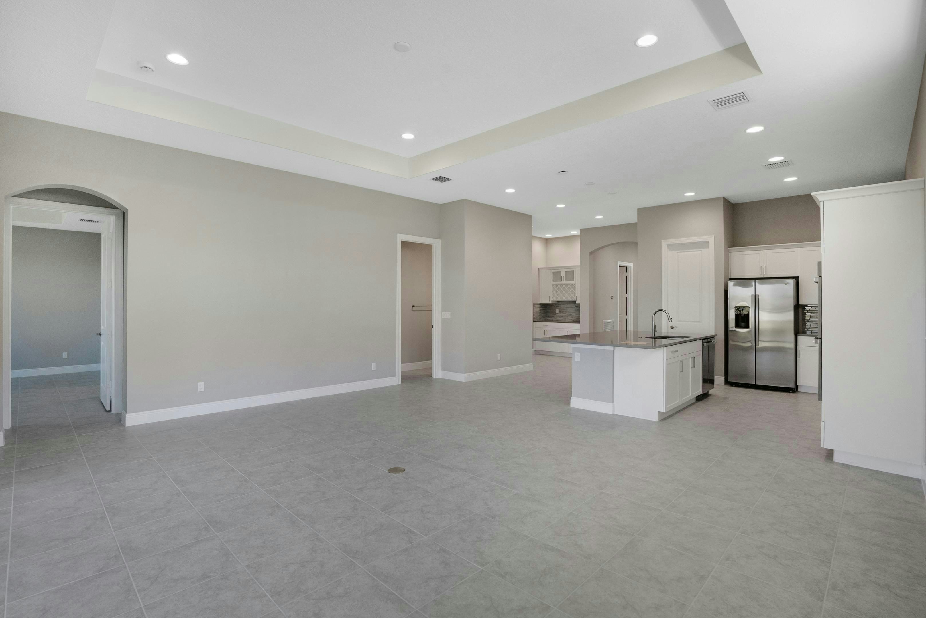 Great Room to Kitchen | 12446 SW Sunrise Lake Terrace
