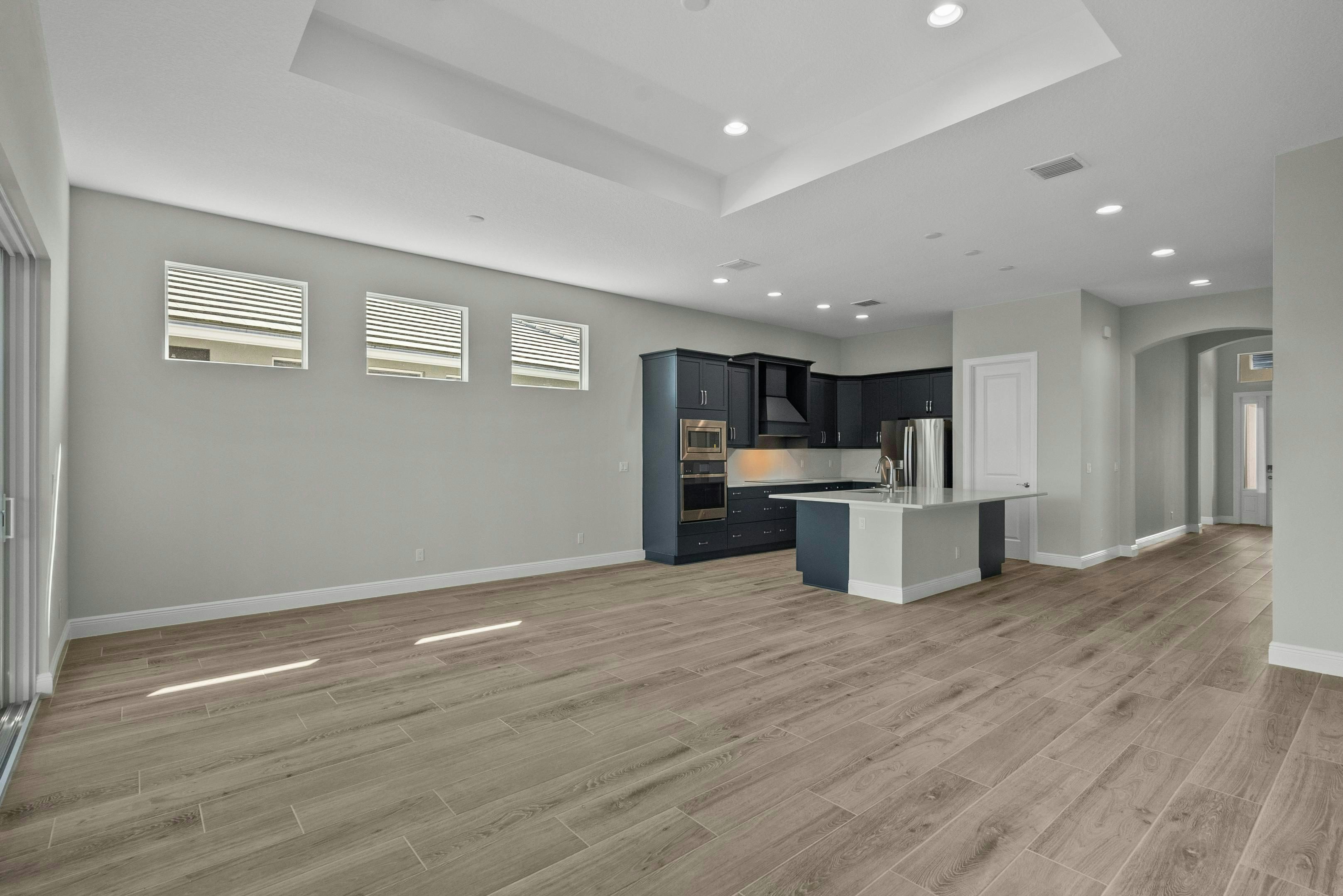 Great Room to Kitchen | 12501 SW Sunrise Lake Terrace