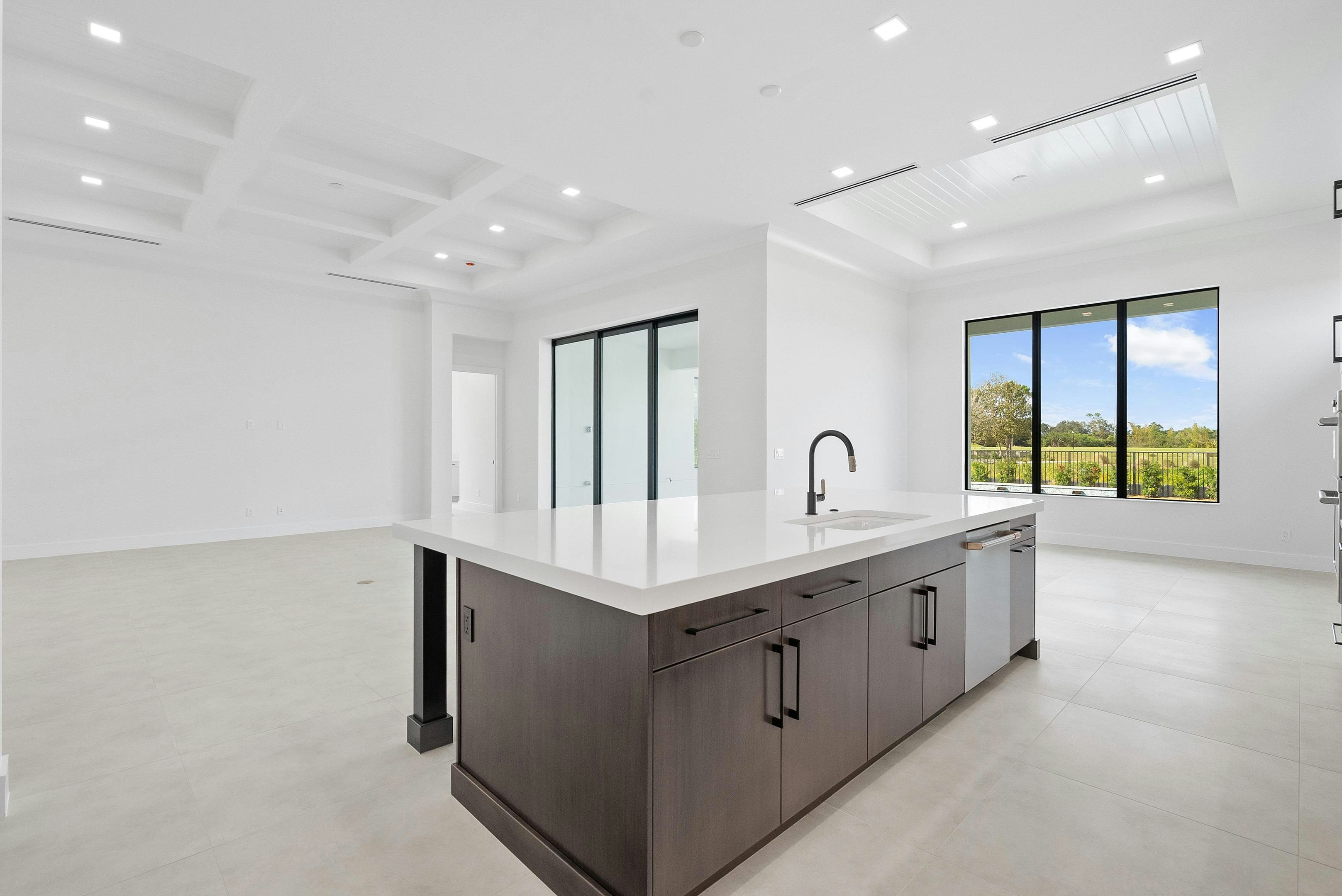 Kitchen, Great Room & Dining | 170 SE Rio Angelica