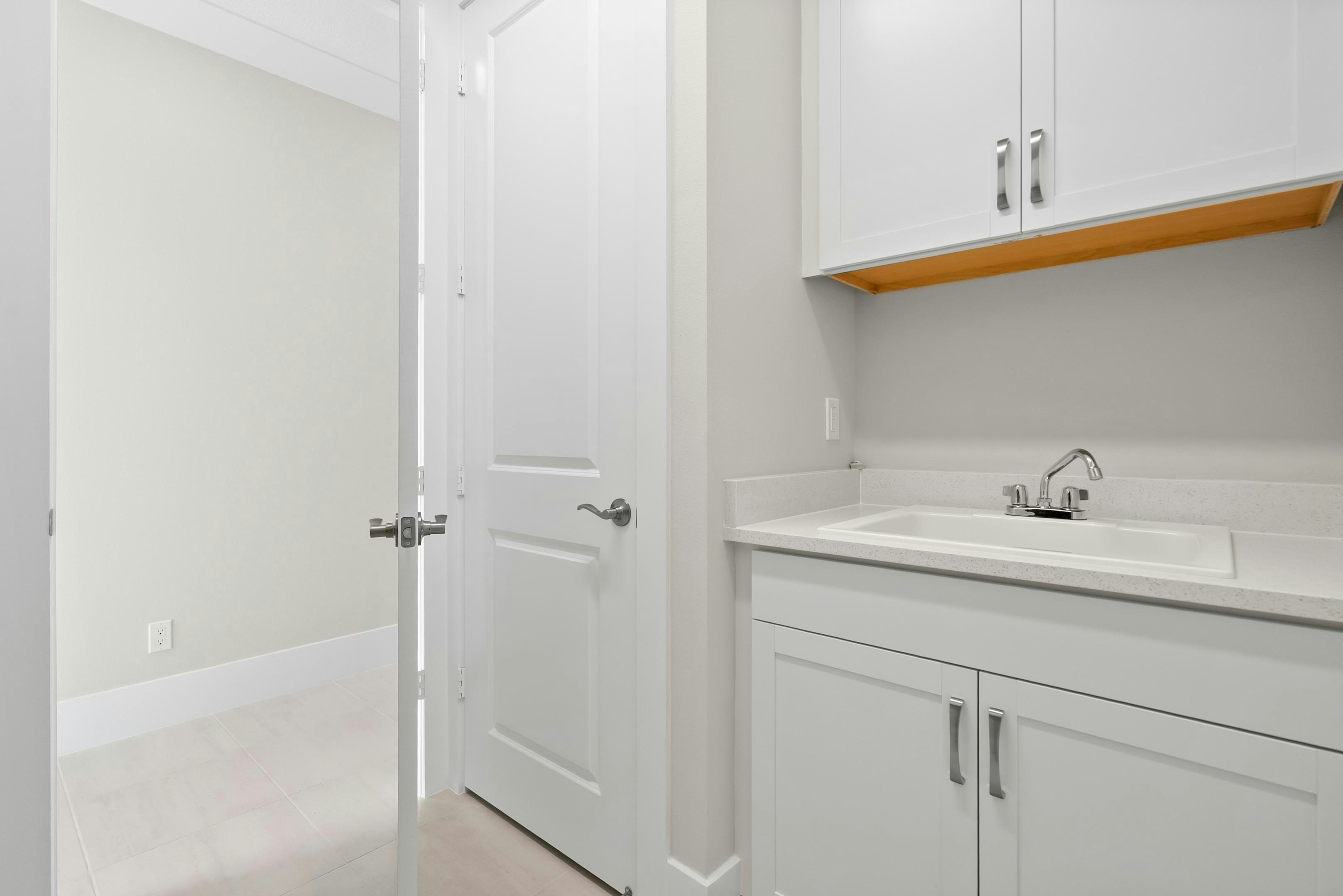 Laundry Room | 2147 Falls Manor