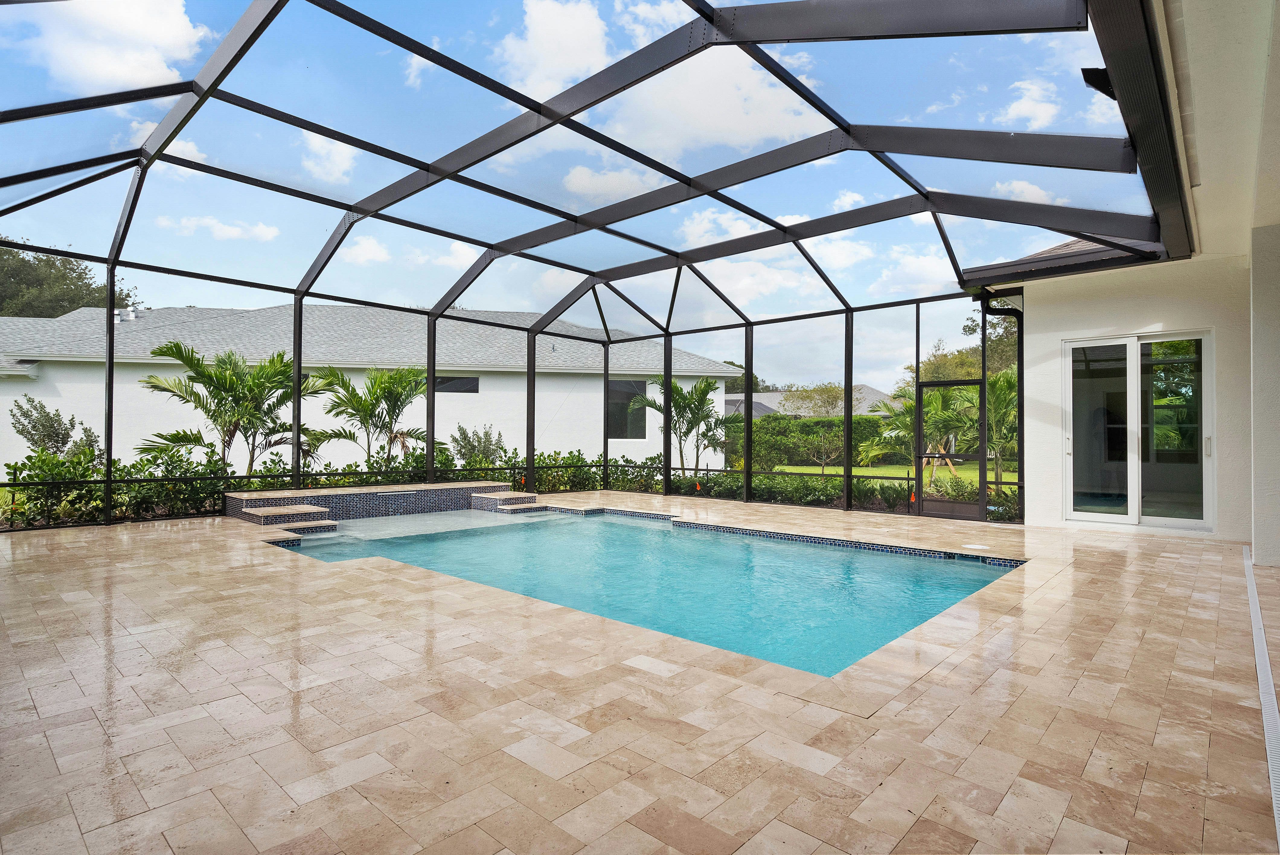 Screened Pool & Pool Deck | 236 Oak Hammock Cr SW