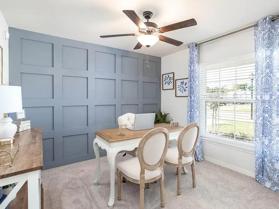 Home office with custom millwork wall treatment