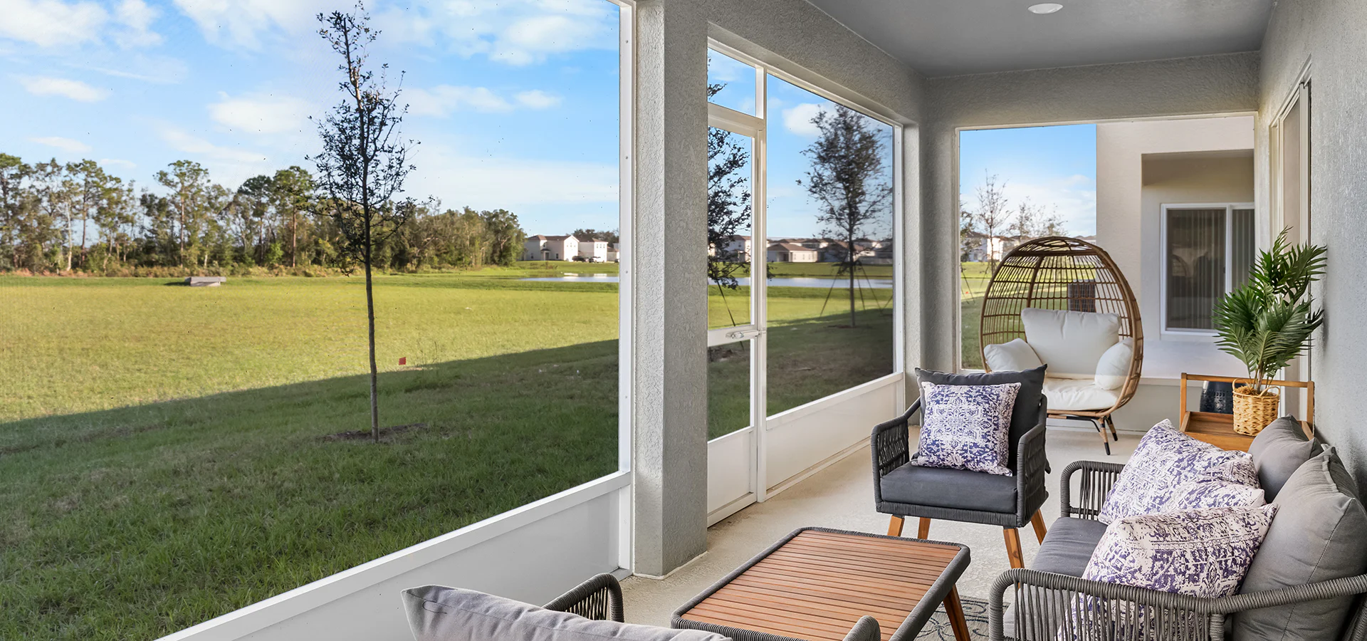 Large screened lanai with multiple seating options and greenbelt views