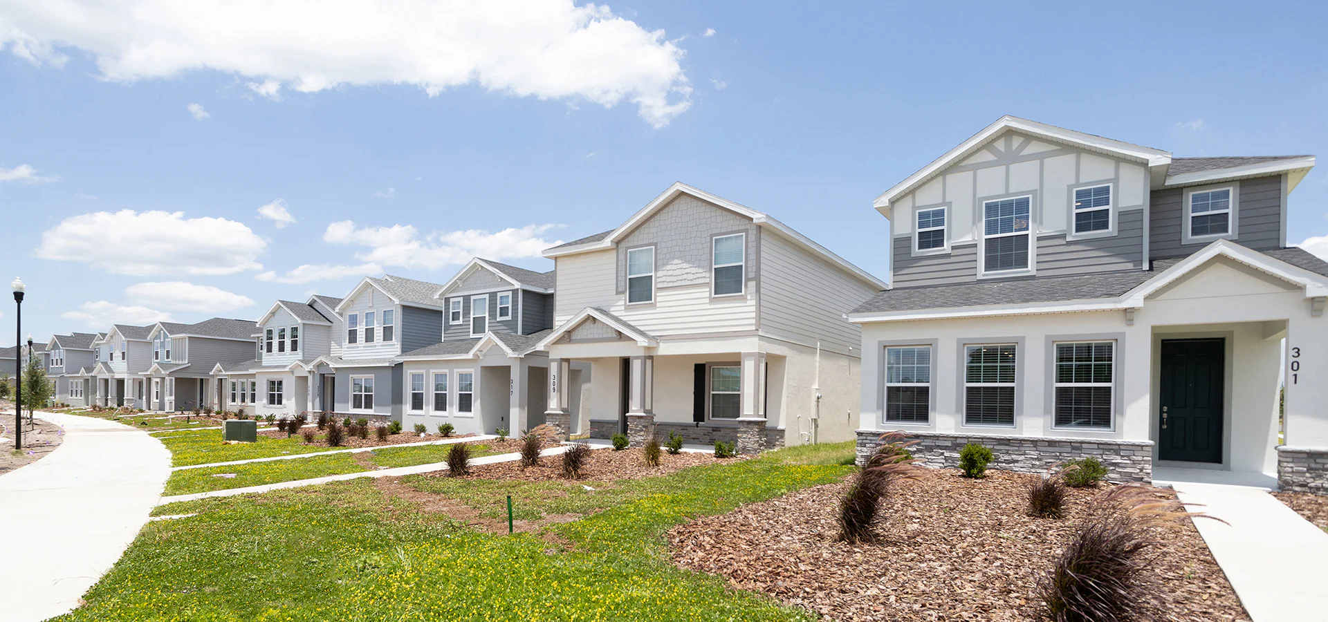 Street view of new construction bungalows in St. Cloud, FL
