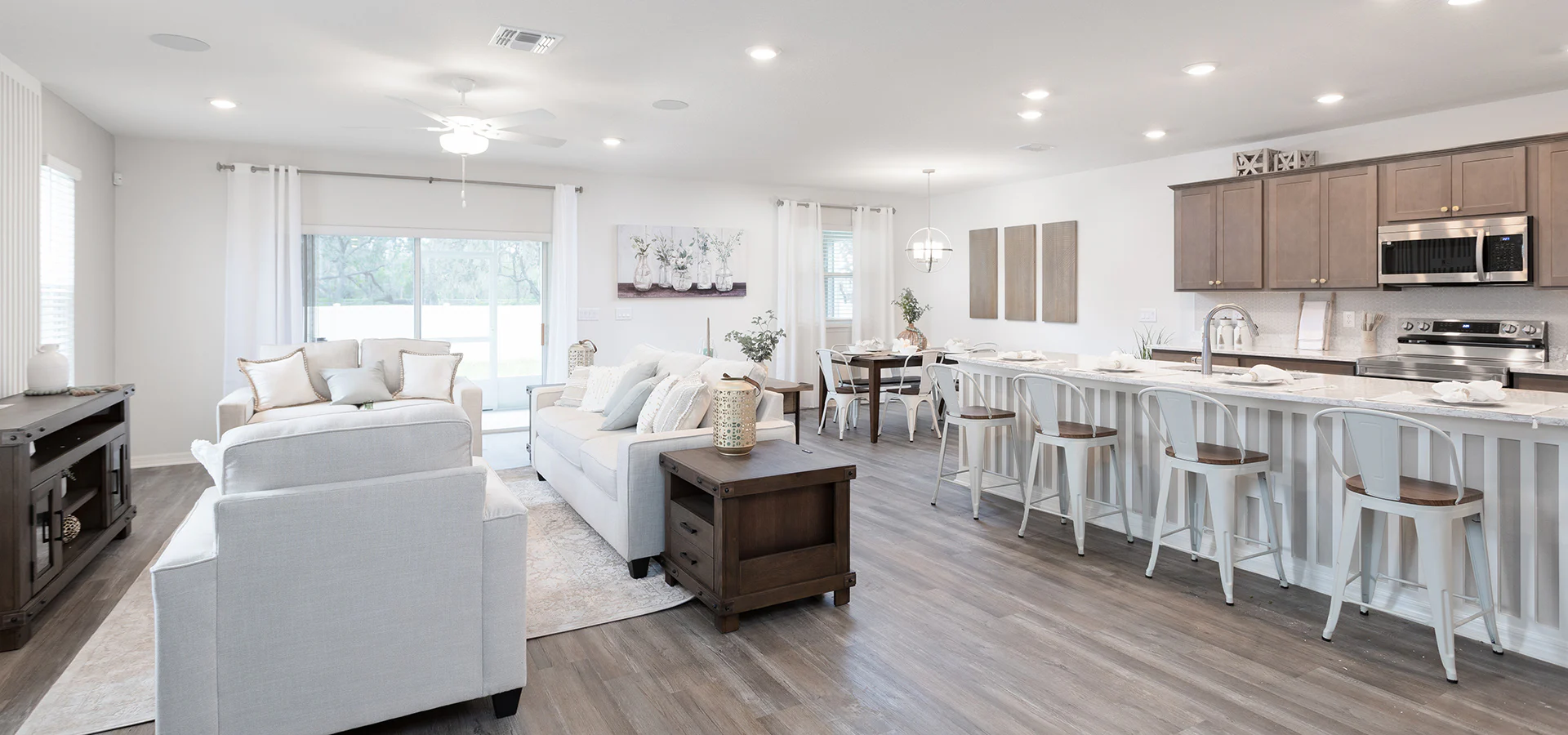 Open living area in the Wesley II by Highland Homes in Lakeland, FL