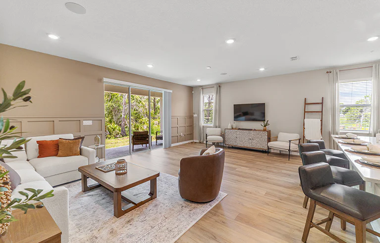 Spacious, sunny living area in the Birch townhome by Highland Homes in St. Cloud, FL