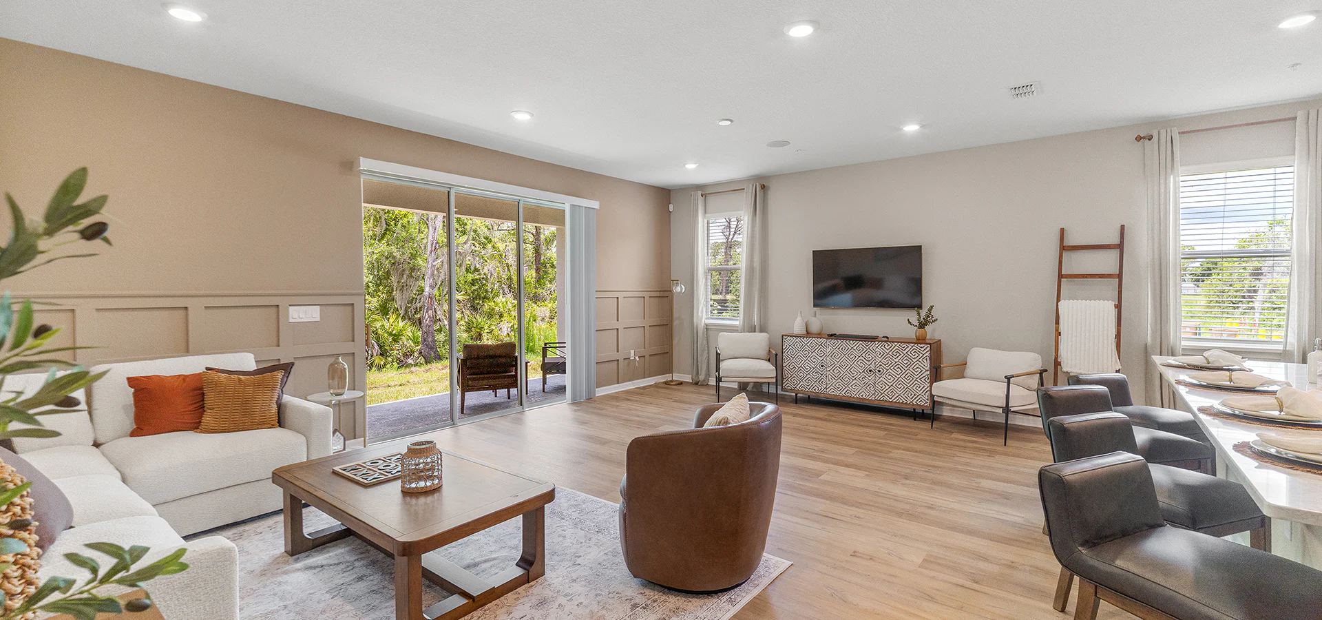 Spacious, sunny living area in the Birch townhome by Highland Homes in St. Cloud, FL